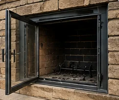 Fireplace repair with restored firebox components